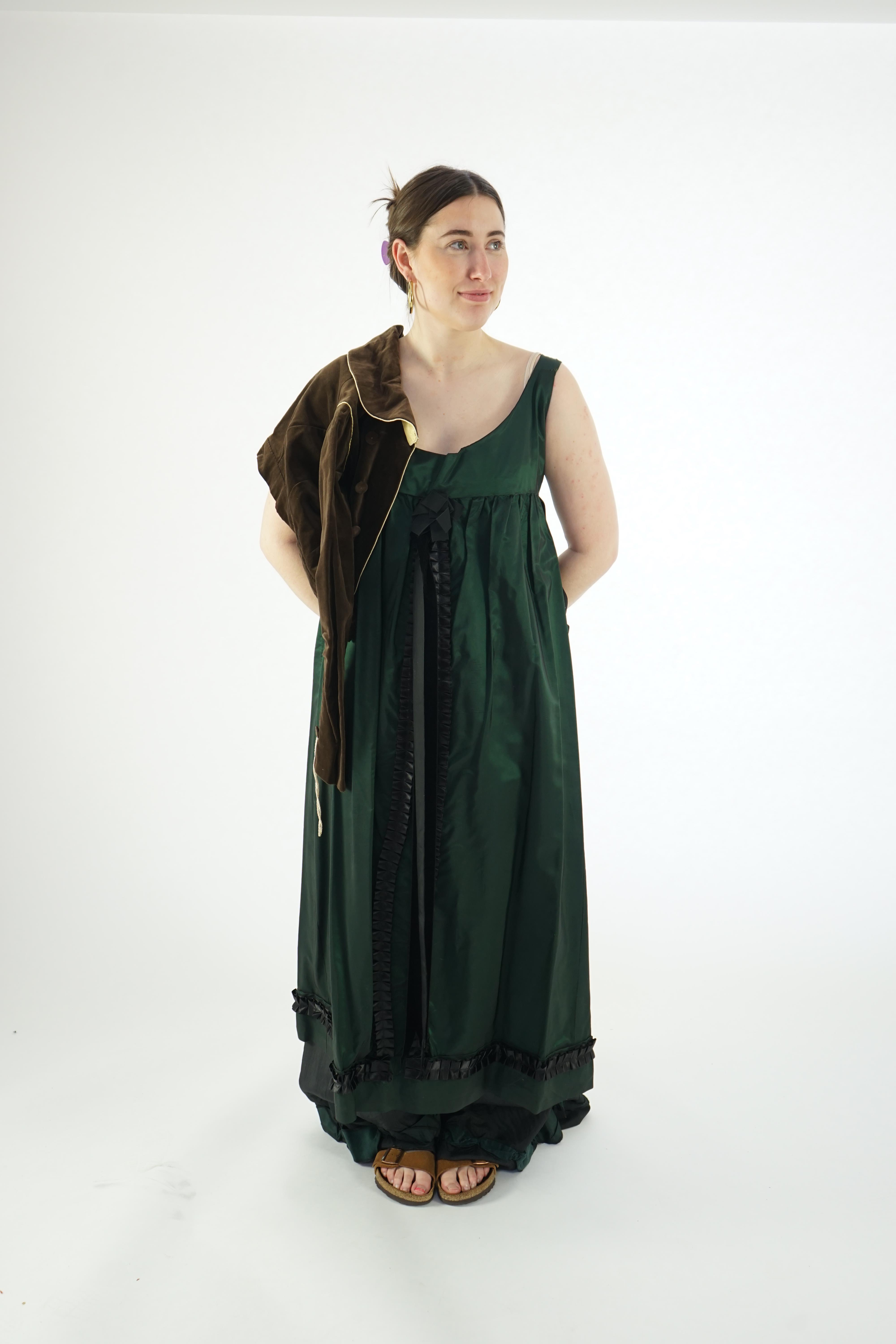 Two lady's Regency style day dresses (1 x dark green taffeta dress with brown short jacket and 1 x bottle green fine cord day dress and short matching jacket)., Ex Carl Rosa Opera Company.